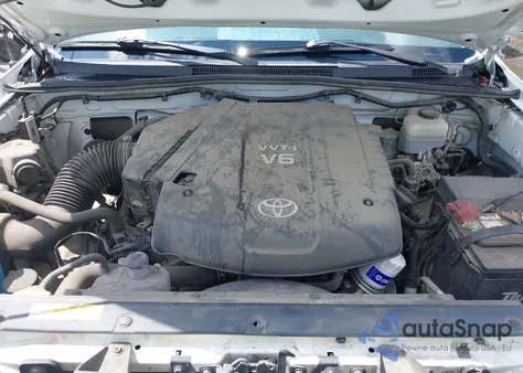 2015 Toyota Tacoma Base V6 z USA, uszkodzony, nr VIN 3TMLU4EN5FM169482